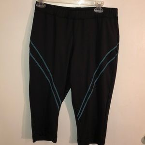 JW Active black capris with turquoise stripes.